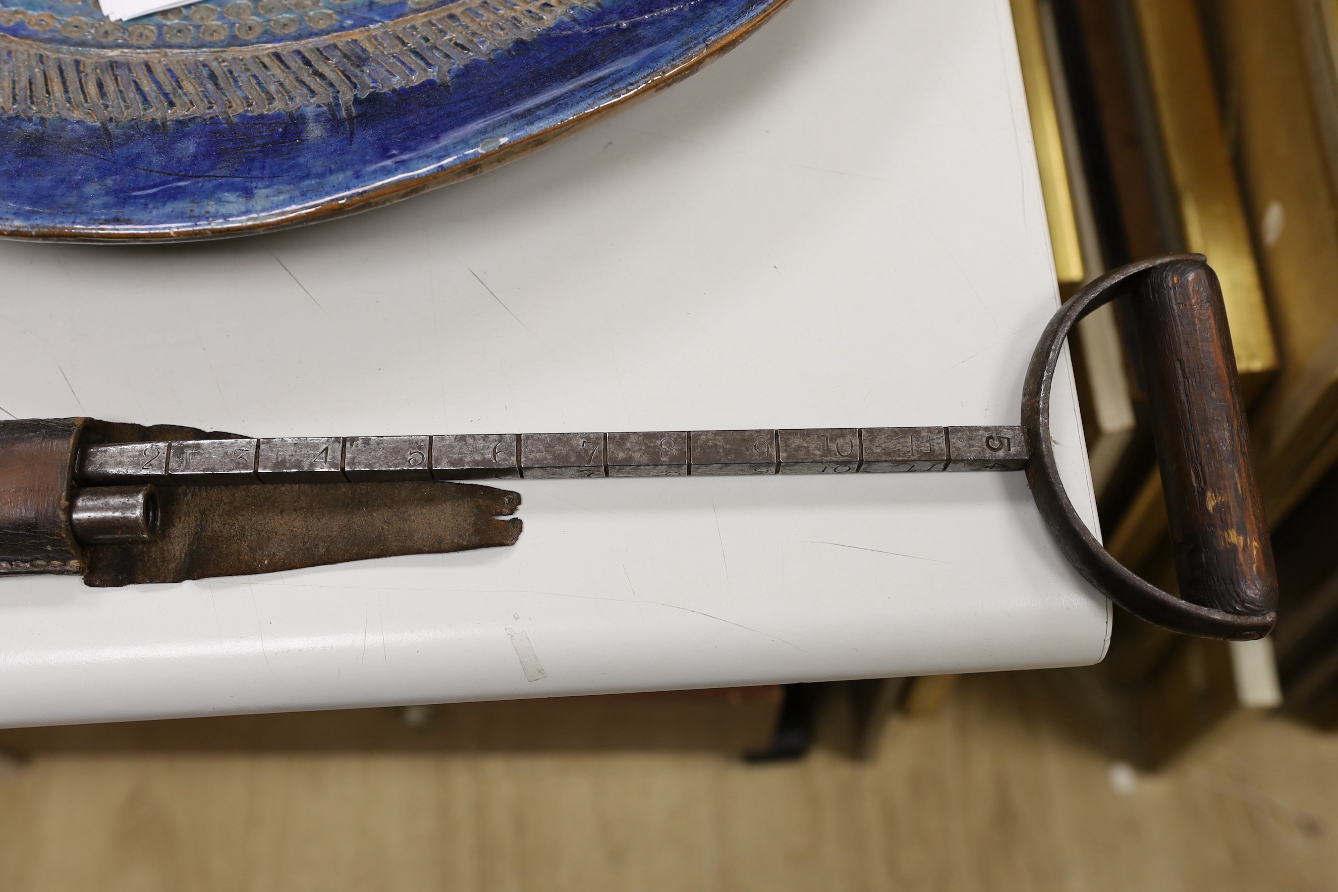 Four Victorian surveyors measuring rods, in leather cases